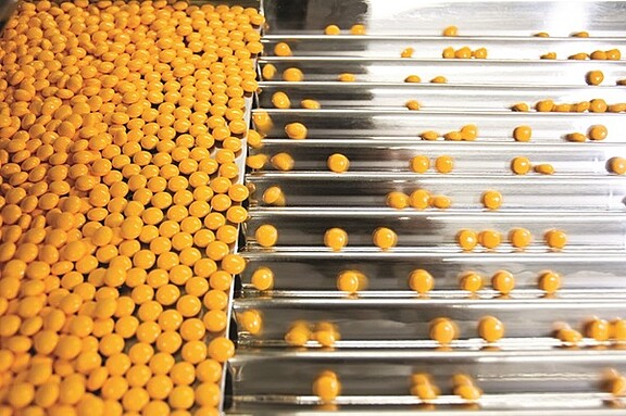 Pharmaceutical tablets in production line